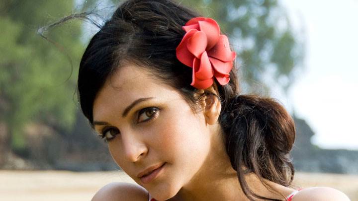 Sweet Looking Denise Milani Smiling Side Face Closeup